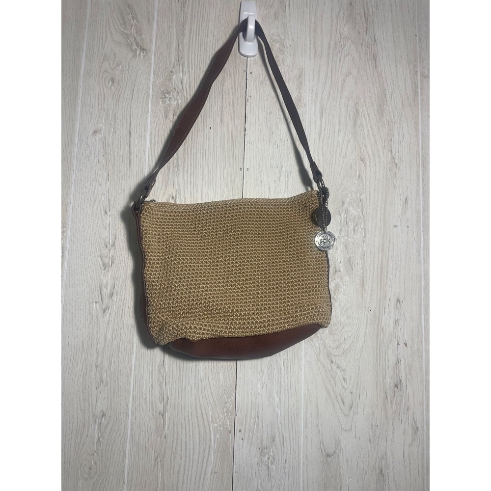 The SAK Crochet Leather Strap Etched Hardware Bamboo Color Hobo